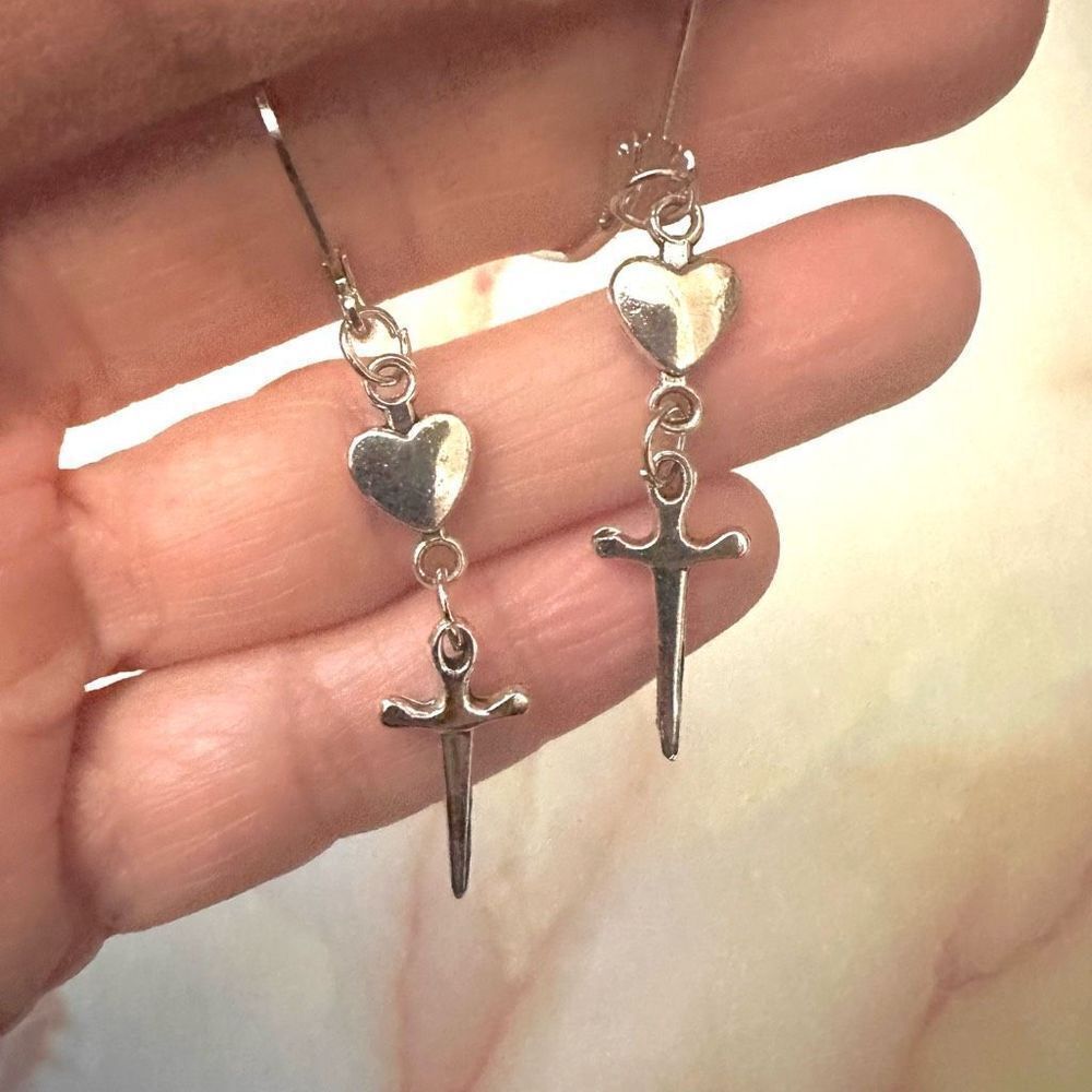 Silver tone heart and cross earrings